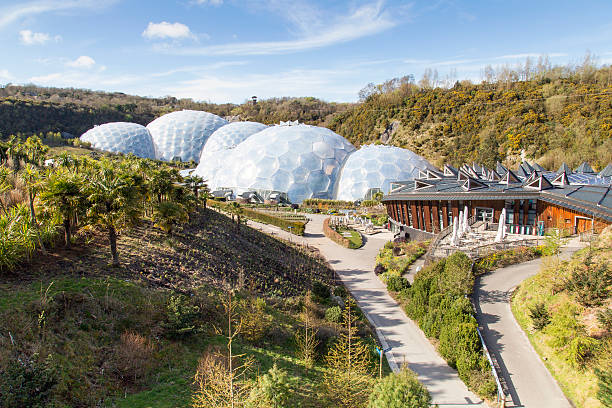 Inside the biomes, plants from many diverse climates and environments have been collected and are displayed to visitors. The Eden Project is located in a reclaimed Kaolinite pit, located about 5 kilometres from the town of St Austell, Cornwall in England.